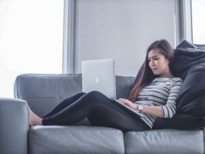woman researching on laptop
