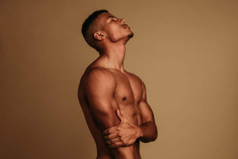 Muscular man, shown in side profile, after a fat transfer procedure